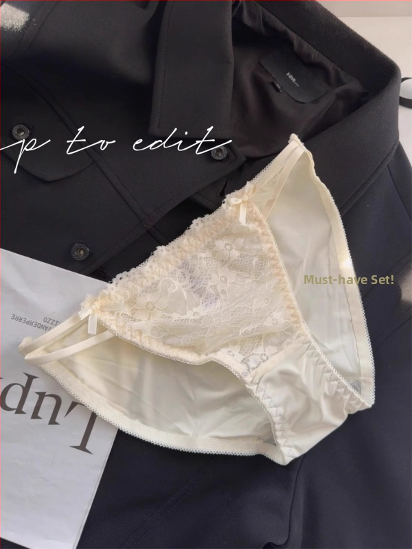 Mežģīņots halter krūšturis, kausi plāni augšā un biezāki apakšā, aizmugurē trīs sprādžu kārtas, noņemamās siksniņas, neilona mežģīne ar spandex pamatni