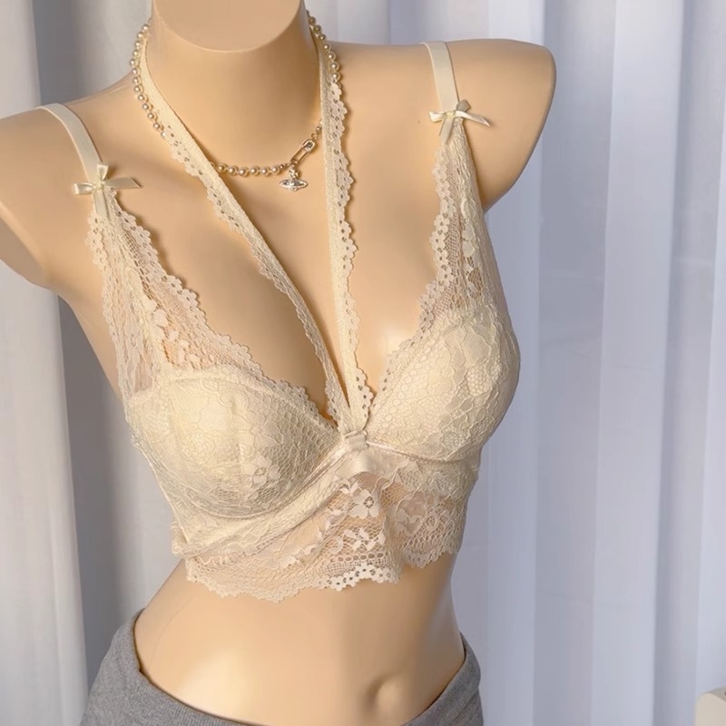 Mežģīņots halter krūšturis, kausi plāni augšā un biezāki apakšā, aizmugurē trīs sprādžu kārtas, noņemamās siksniņas, neilona mežģīne ar spandex pamatni