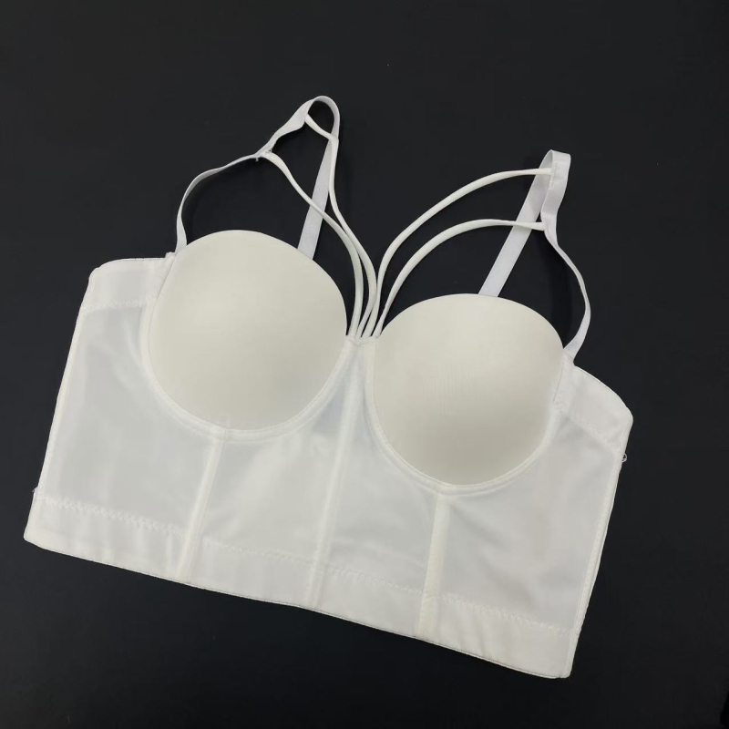 Mežģīņu krūšu kamizole ar zivs kaulu, noņemamās dubultās siksnas, galvenais materiāls: neilons 70–80%, formētas krūšu kauss, funkcijas: savākšana, augšējā atbalsta un ķermeņa veidošana