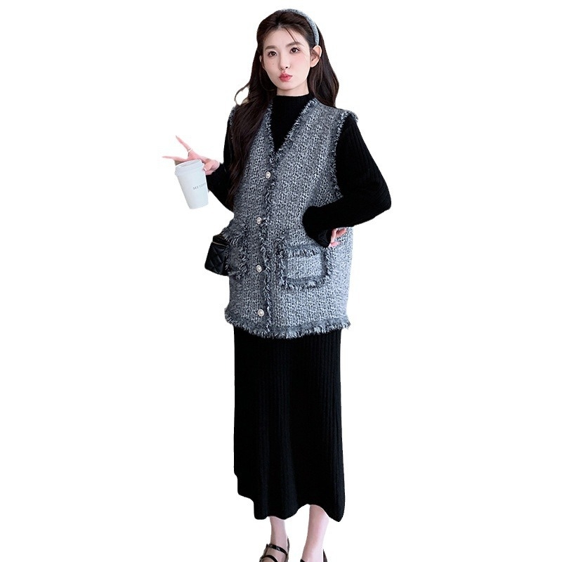 Kostim sa suknjom | Uzorak: Houndstooth | Pleteni materijal | Poliester 50-70% | Akril <30% | Duljina: midi suknja