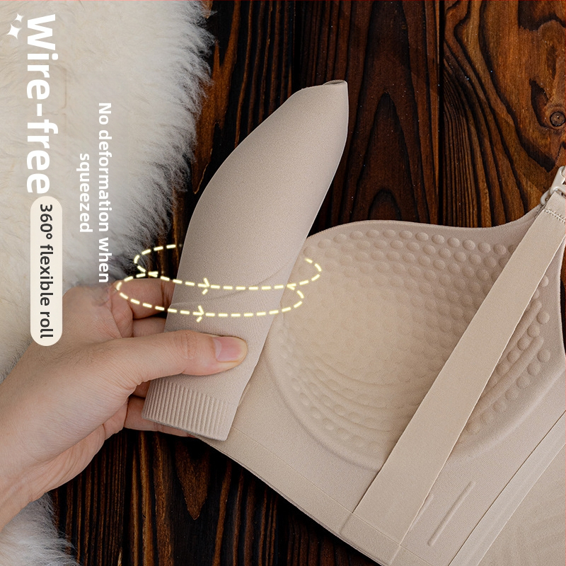 Dojčiaca podprsenka z jedného dielu, tenké tvarované košíky, pevné dvojité ramienka, zadná štyri rady háčikov, nylonová tkanina s hlavným obsahom bavlna 70-80% a podšívka bavlna 50-70%.