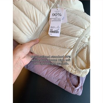 Nailona jaka ar plānu siluetu, 86–90% balta pīļu pūka, rāvējslēdzējs