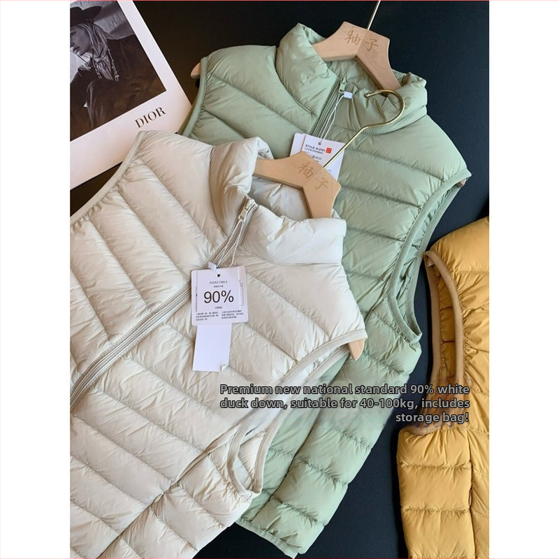 Nailona jaka ar plānu siluetu, 86–90% balta pīļu pūka, rāvējslēdzējs