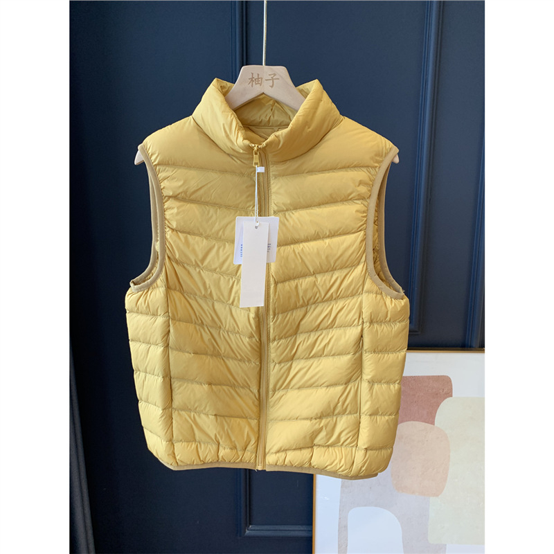 Пухен жилет от найлон, тънък силует, съдържание пух 86–90%, цип, тясно прилягащ