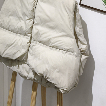 Sieviešu īsa dūnu veste ar neilona ārējo materiālu, balto pīļu dūnu pildījums, 50% dūnu, rāvējslēdzējs, apaļš kakls