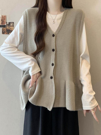 Kötött ujjatlan mellény V-nyakú kivágással, egyszínű, hossz 50–65 cm, spandex tartalom 30% alatt