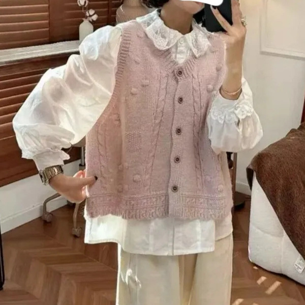 Top tricotat fără mâneci, guler rotund, croială lejeră, lungime normală, amestec acrilic-poliester