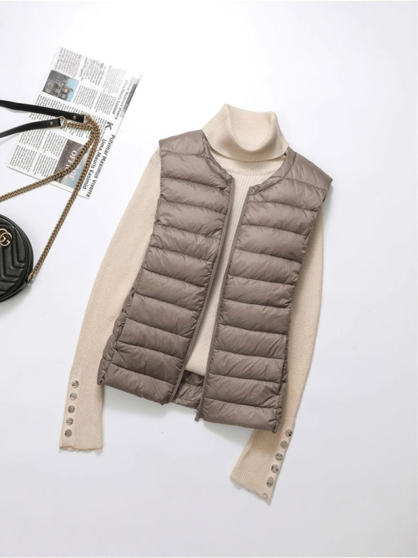 Női pehelyes mellény, 50% pehelytartalom, hossz 50–65 cm, cipzár