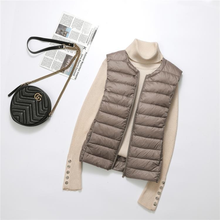 Női pehelyes mellény, 50% pehelytartalom, hossz 50–65 cm, cipzár