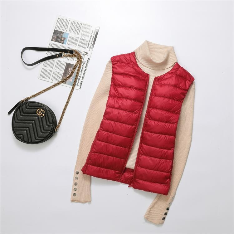 Női pehelyes mellény, 50% pehelytartalom, hossz 50–65 cm, cipzár