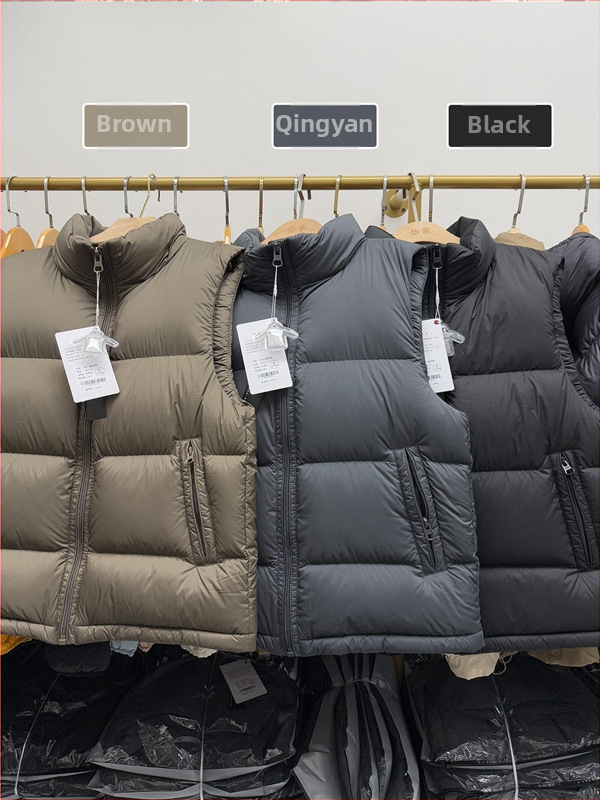 Pánska vesta z down s stojacim golierom, zipsom, voľný strih, zima, výplň kačacieho peria 86-90%, vonkajší polyester