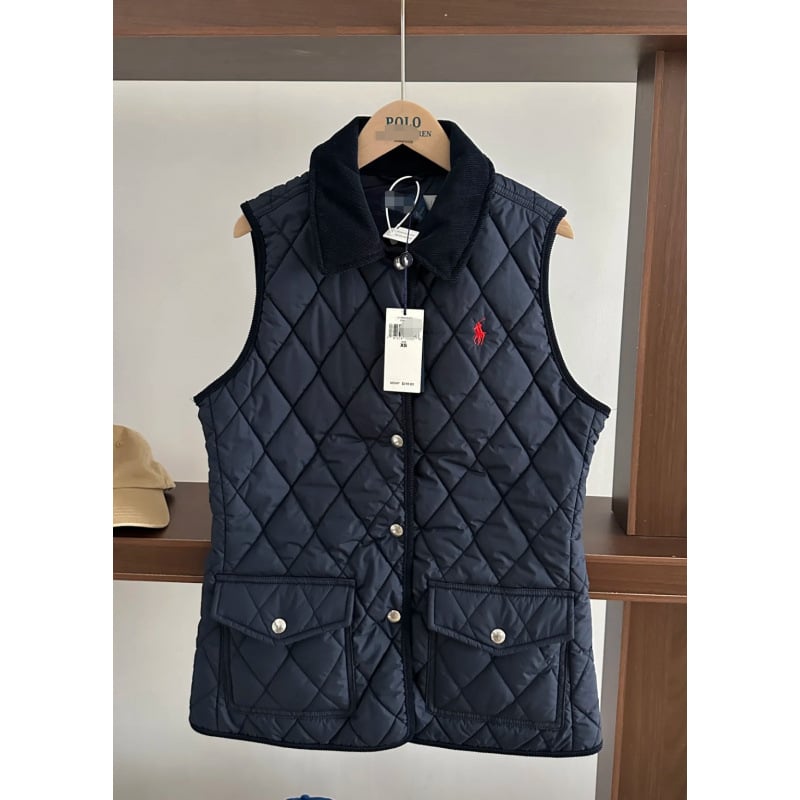 Vesta s rombnim uzorkom, vanjski materijal preko 95% poliester, punilo od poliester vlakana, polo ovratnik