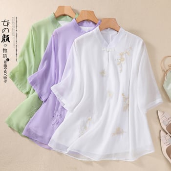 Cămașă relaxată din viscoză, broderie florală, mâneci scurte, guler înalt.