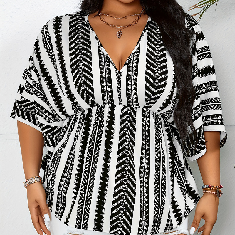 Virágos-szálas rövid ujjú blúz poliészterrel és spandexszel, mély V-nyakú, középmagas hosszúságú