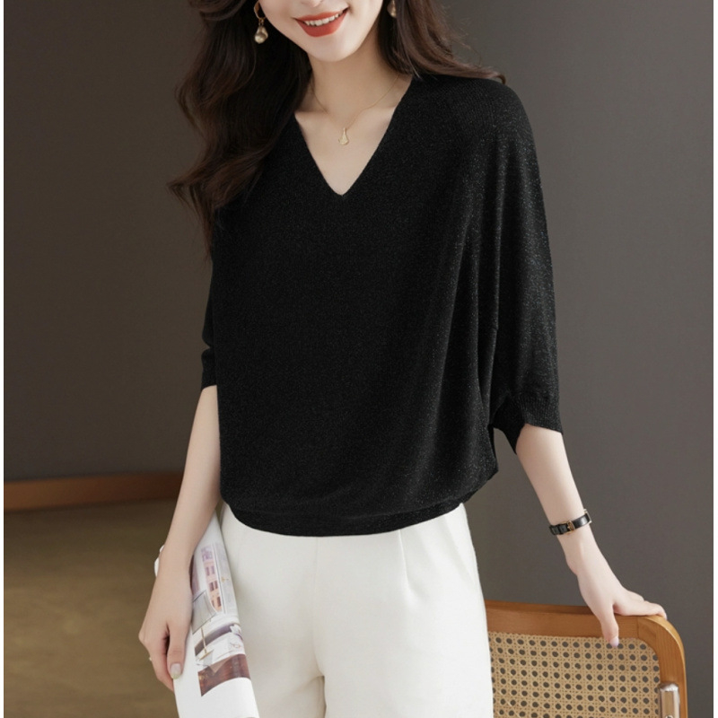 Плетена блуза с V‑образно деколте, ръкав 3/4 тип бухал, свободен силует, тънка полиестерна тъкан