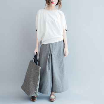 Bluza damă cu mâneci tip bat și croială lejeră, guler lotus, țesătură acrilică, tiv spate cu dungi