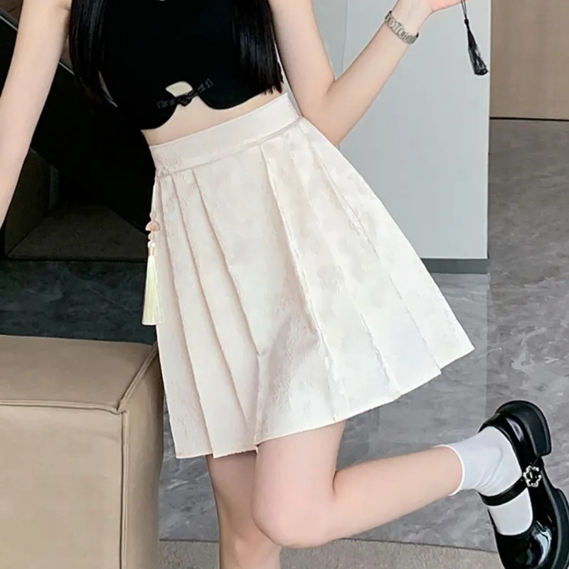 Kratka plisirana suknja od jacquard poliestera, elastičan pojas, visoki struk, apstraktni uzorak, ljeto 2025