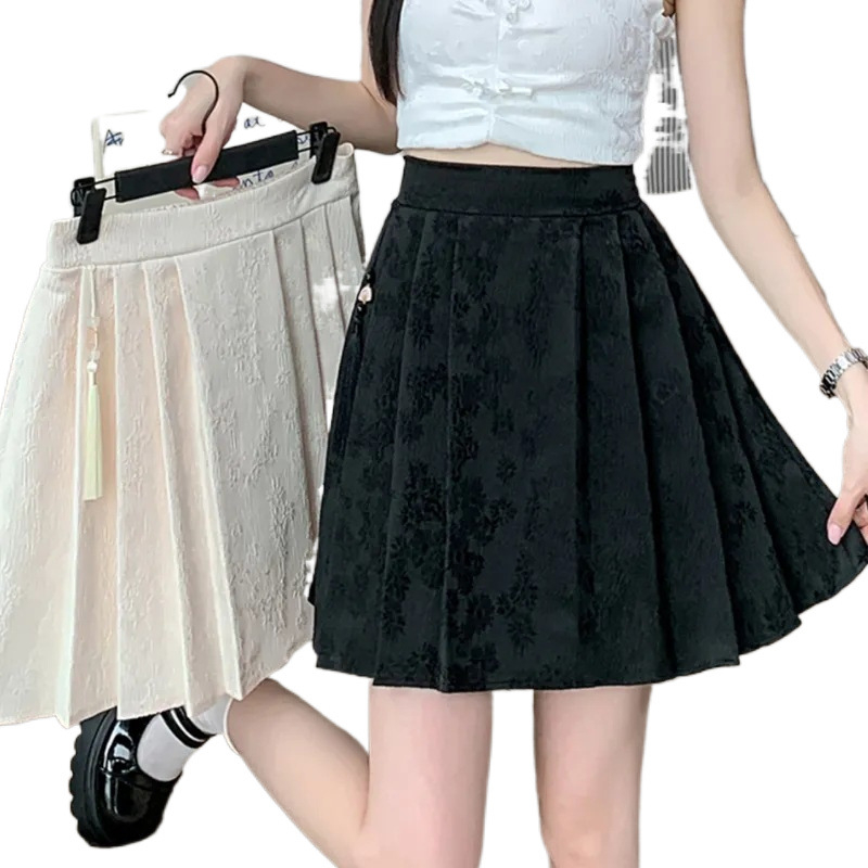 Kratka plisirana suknja od jacquard poliestera, elastičan pojas, visoki struk, apstraktni uzorak, ljeto 2025