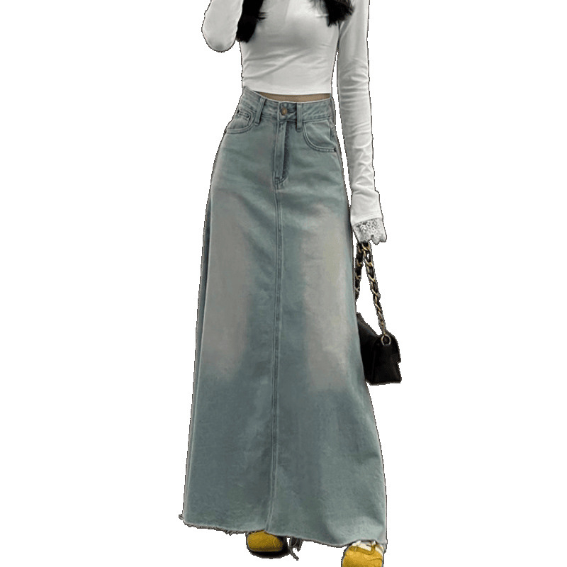 Duga džins suknja s visokim strukom, oprani denim, zatvarač i džepovi, proljeće 2025.