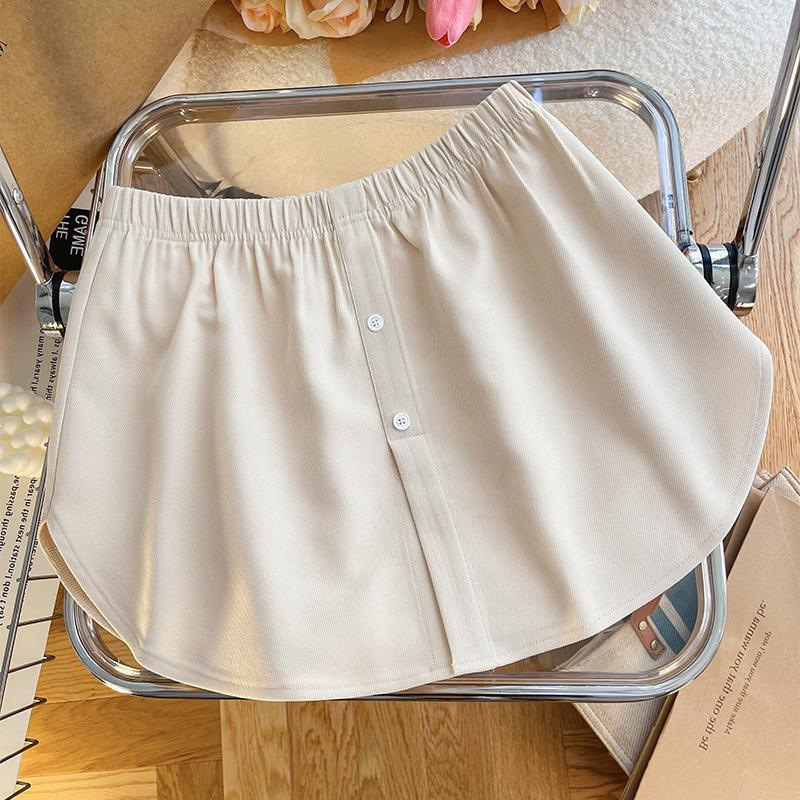 A linijos trumpas sijonas, vienos spalvos, poliesterio audinys, panelinis siuvimas, žiemos 2023