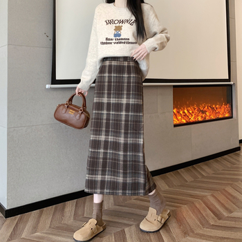 Ilgos vilnos sijonas su languotu raštu, platėjanti silueto linija, poliesterio-elastano mišinys (elastanas <30%), elastinga, ruduo 2025