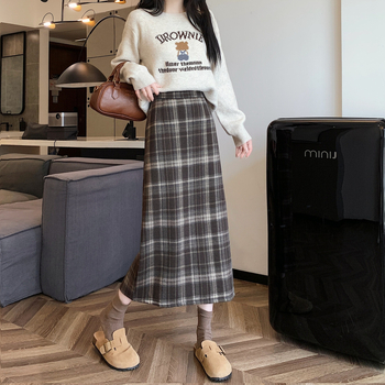 Ilgos vilnos sijonas su languotu raštu, platėjanti silueto linija, poliesterio-elastano mišinys (elastanas <30%), elastinga, ruduo 2025