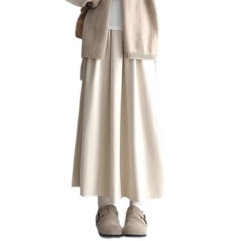 Trudnička suknja s podrškom za trbuh, silueta kišobran, poliester 70–80%, jesen 2025