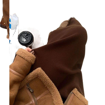 Fustă tricotată evazată cu ciucuri, lungime midi, din lână, stil suroră regală