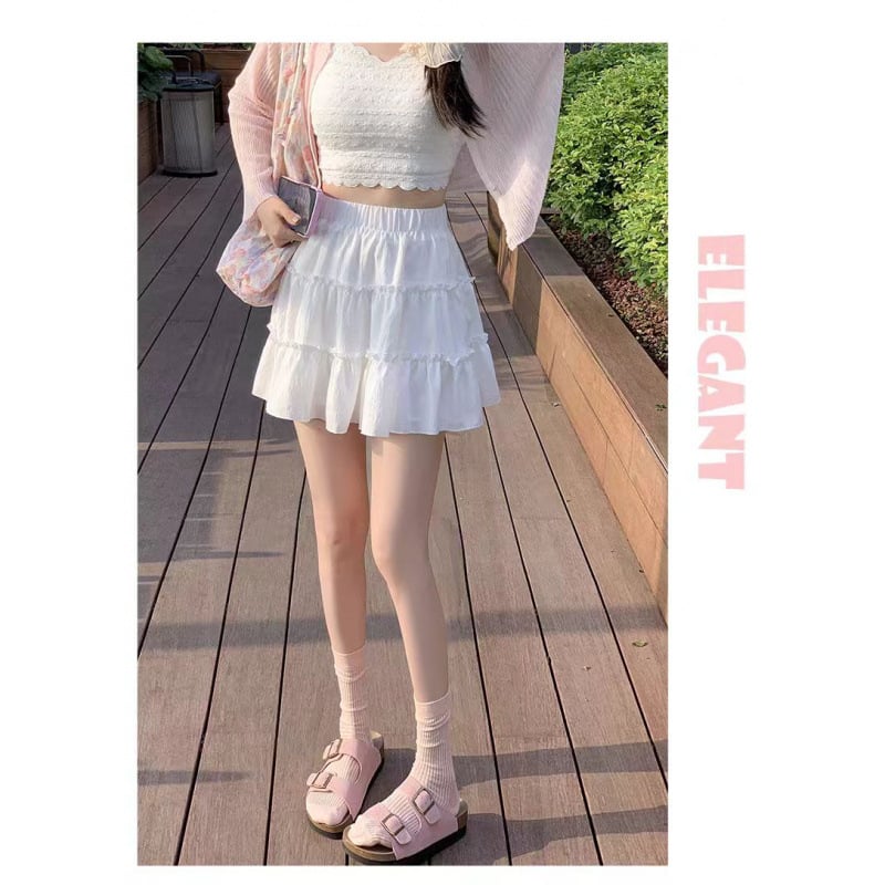 Női A-vonalú magas derekú midi szoknya, street-hipster stílus, nyár 2025, anyagösszetétel 95%+.