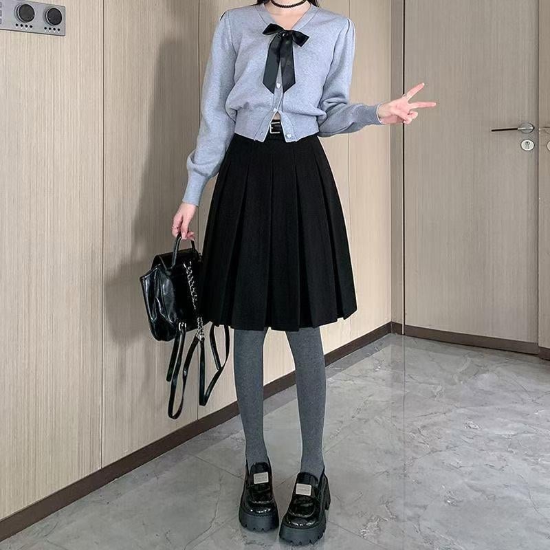 Plisirana midi suknja od pamukasto-mije tkanine, mikroelastična, jesen 2025