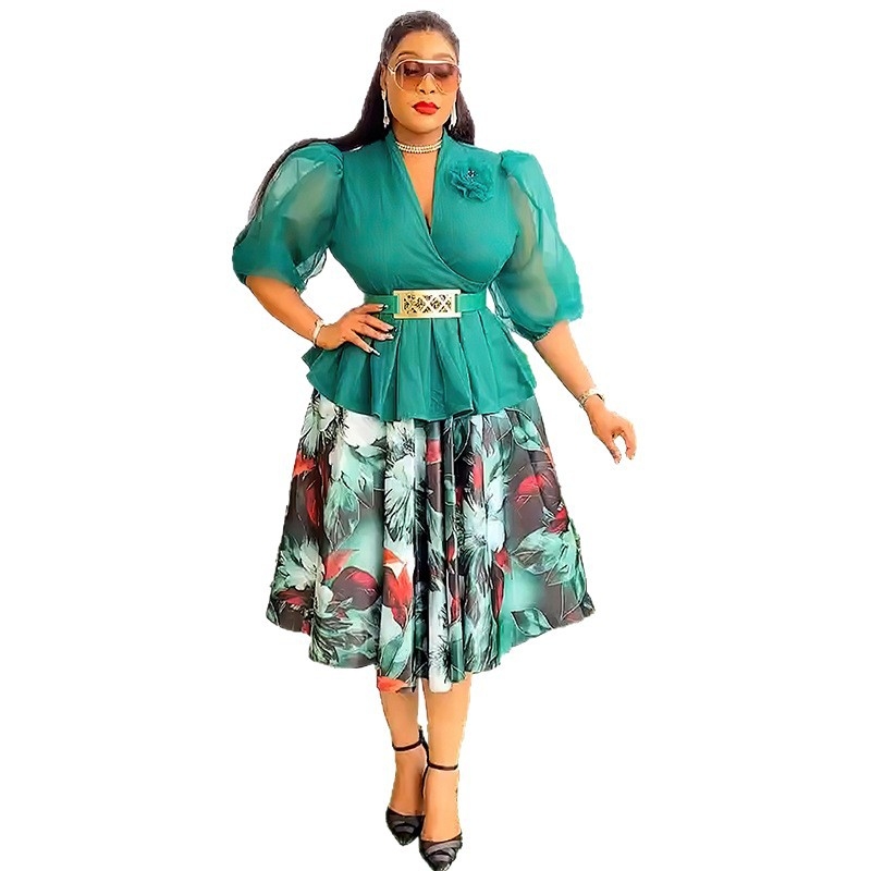 Dvo-djelni set: chiffon top i midi duljine suknja; uzorak: biljni cvjetni; rukavi: naborni, 3/4; tkanina: Drikong tkanina + imitacija svilenog satena; sezona: ljeto 2025