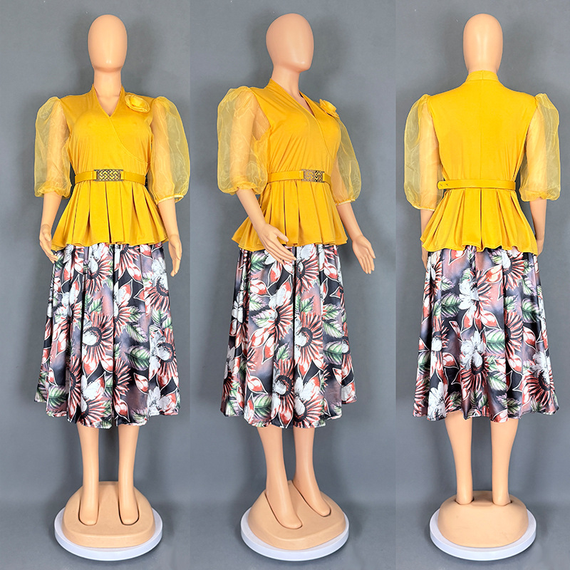 Dvo-djelni set: chiffon top i midi duljine suknja; uzorak: biljni cvjetni; rukavi: naborni, 3/4; tkanina: Drikong tkanina + imitacija svilenog satena; sezona: ljeto 2025