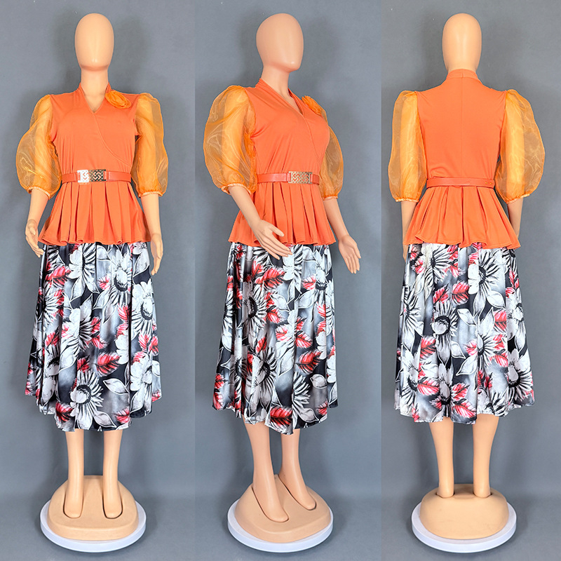 Dvo-djelni set: chiffon top i midi duljine suknja; uzorak: biljni cvjetni; rukavi: naborni, 3/4; tkanina: Drikong tkanina + imitacija svilenog satena; sezona: ljeto 2025
