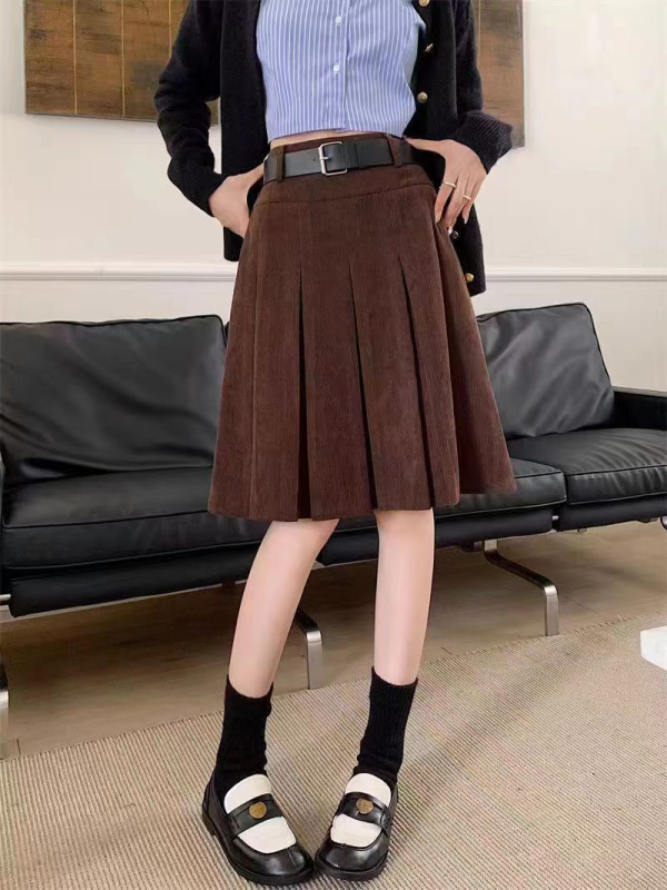 Geometrijski uzorkovana plisirana midi suknja od velur-elastičnog materijala, visokim strukom, jesen 2025