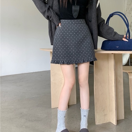 Suknja A-linije od vunene smjese s uzorkom valovito-točaka; tkanina vuna i elastan; jesen 2025