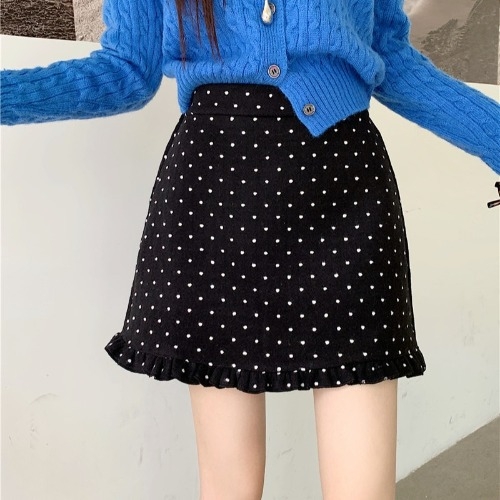 Suknja A-linije od vunene smjese s uzorkom valovito-točaka; tkanina vuna i elastan; jesen 2025