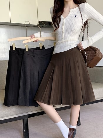 A-vonalú pliszírozott midi szoknya, magas derekú, poliészter (70–80%), 2025 tél