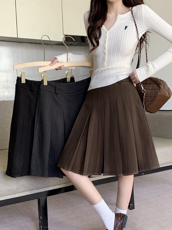 A-vonalú pliszírozott midi szoknya, magas derekú, poliészter (70–80%), 2025 tél