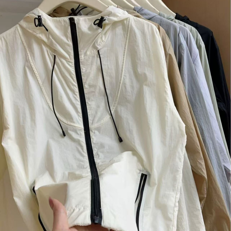 Sieviešu kapucēta neilona jaka ar UV aizsardzību, vēju izturīga un ūdens atgrūdoša, āra sporta stils, vasara 2025