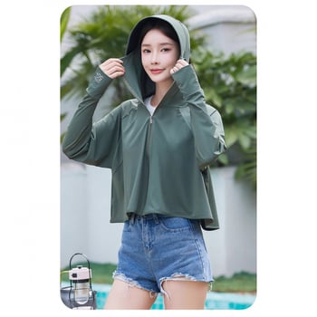 Ženska odjeća za zaštitu od sunca u stilu plašta, prozračan poliester, slobodan kroj, dugi rukavi, zatvarač, duljina 50–65 cm, sastav 90–95% poliester + 30–50% sekundarnog poliester