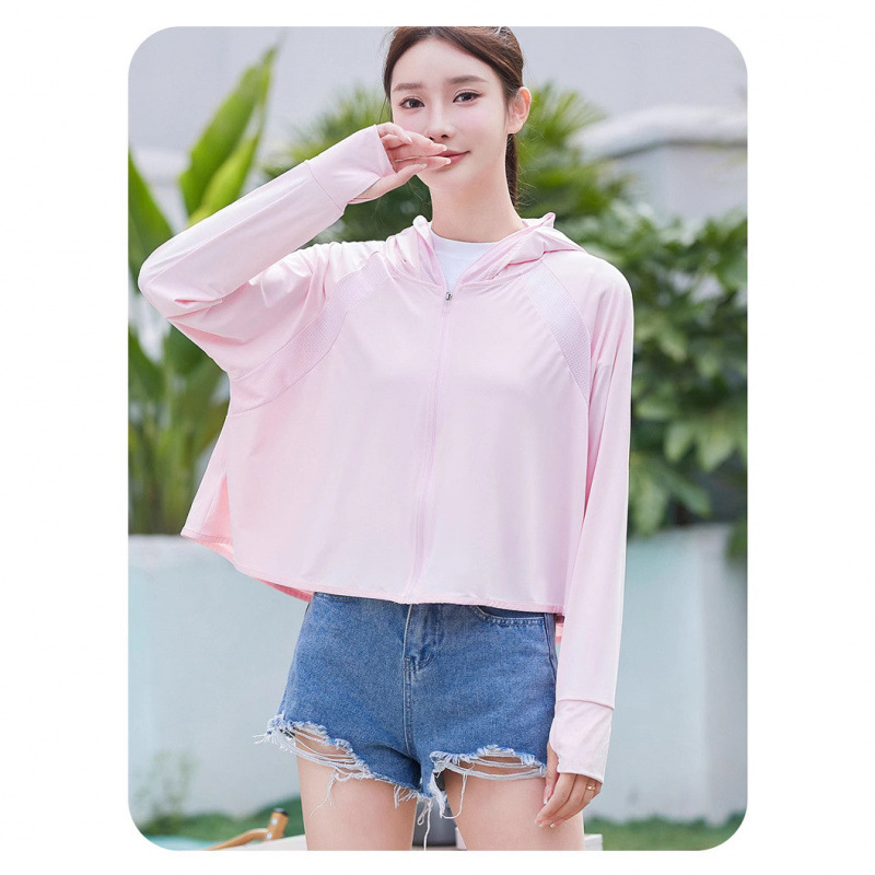 Ženska odjeća za zaštitu od sunca u stilu plašta, prozračan poliester, slobodan kroj, dugi rukavi, zatvarač, duljina 50–65 cm, sastav 90–95% poliester + 30–50% sekundarnog poliester