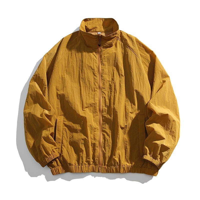 Nylon könnyű kabát, lazán szabott, álló gallér, cipzáras zsebek, nyár