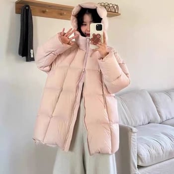 Dámska bunda s kapucňou, stredná dĺžka, výplň 201-300 g páperie, obsah páperia 91-95%, nadýchaný pocit