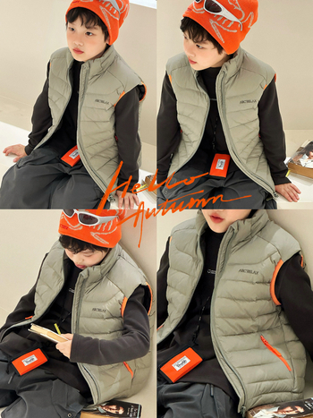 Vesta pentru copii cu puf, fără mâneci, lungime scurtă, croială lejeră; umplutură: puf; conținut puf: 86–90%; material exterior și căptușeală: nylon; fermoar; pentru copii peste 8 ani (peste 140 cm); iarnă 2025