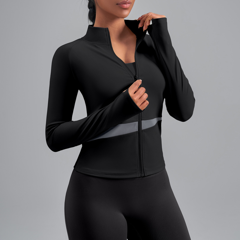 Sievietēm paredzēta persiku krāsu bloku jogas jaka ar augstu kaklu, elpojoša, atklāj vēderu, garas piedurknes, poliestera audums 82,5% — Vasara 2025