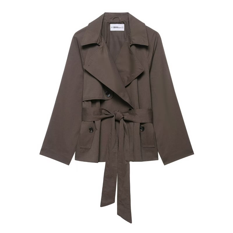 Kratka windbreaker jakna s vezicama sprijeda — poliester; jednobojna; ovratnik u stilu sakoa; dvostruko kopčanje; kratka duljina 40–50 cm