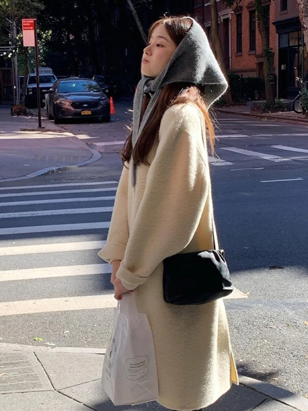 Ženski vuneni kaput s jednostrukim zatvaranjem, ovratnik lapel, dugački kroj iznad 100 cm, slobodan kroj, 70–80% vuna, detalji kolage, zimski stil japansko-korejski