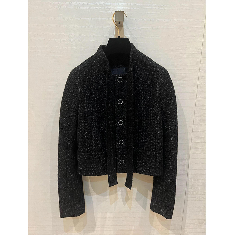 Kaput od tweed tkanine, stojeći ovratnik, kopčanje na jednom redu, srednja debljina, dugi rukavi – elegantan vintage stil