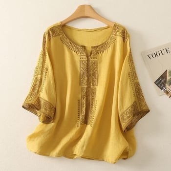 Blúz Tencel-kender anyagból, laza fazon, középméretű ujjak, kerek nyakú, standard hossz 50–65 cm