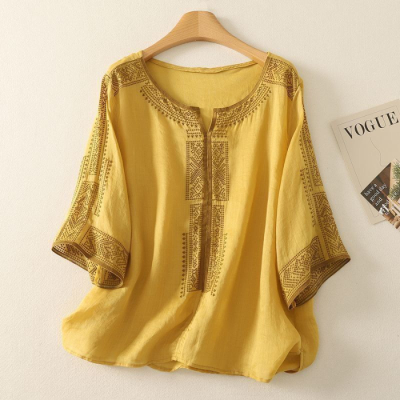 Blúz Tencel-kender anyagból, laza fazon, középméretű ujjak, kerek nyakú, standard hossz 50–65 cm